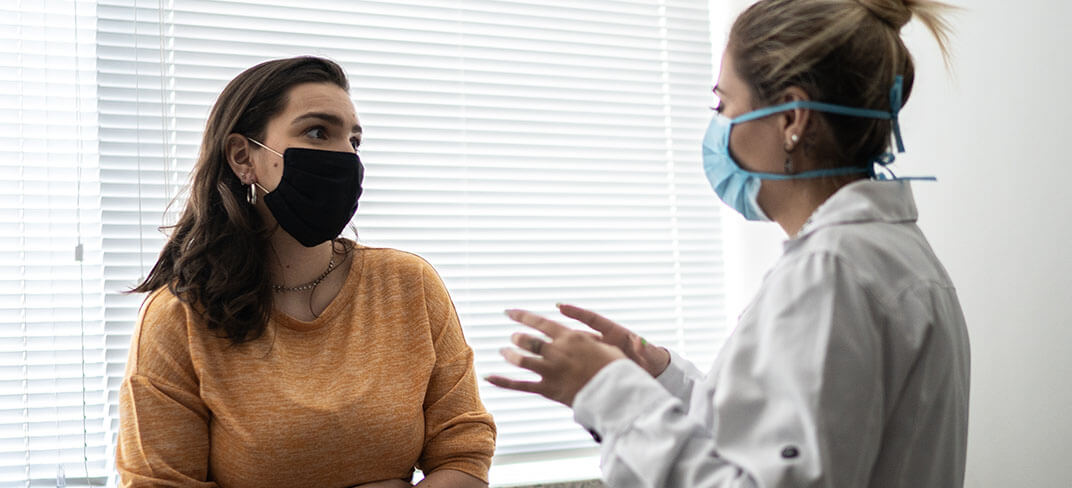 Doctor talking to patient