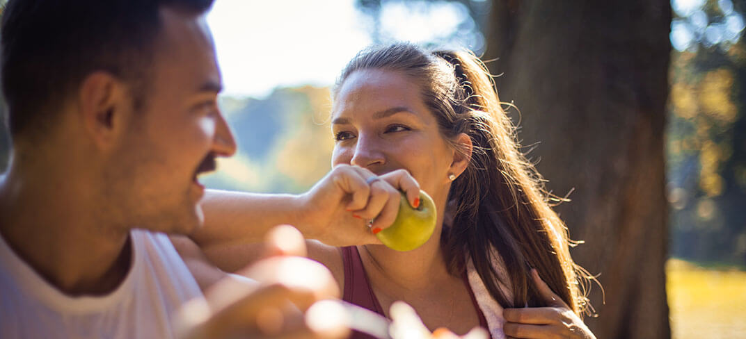 Woman eating an apple